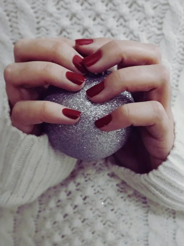 Photo by Brigitte Tohm httpswww.pexels.comphotoperson-holding-gray-ball-239576 (1)